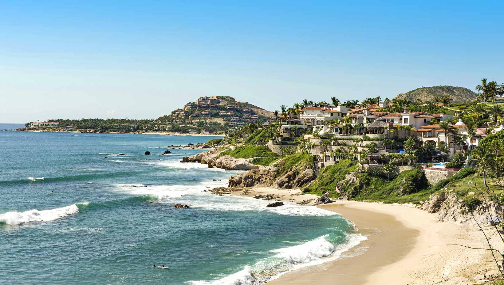 Scenic coastline with luxury villas and sandy beach in a tropical destination | MSC Cruises Scenic coastline with luxury villas and sandy beach in a tropical destination | MSC Cruises