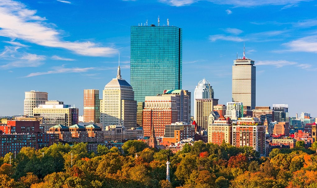 Boston skyline with autumn trees and iconic skyscrapers under a clear blue sky | MSC Cruises Boston skyline with autumn trees and iconic skyscrapers under a clear blue sky | MSC Cruises