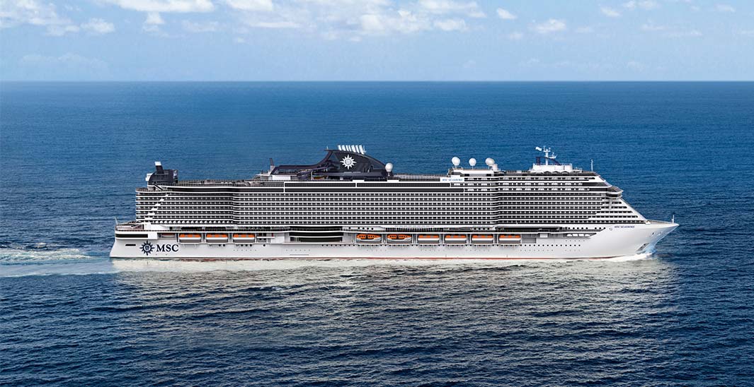 An MSC cruise ship sailing on open blue waters under a clear sky | MSC Cruises
